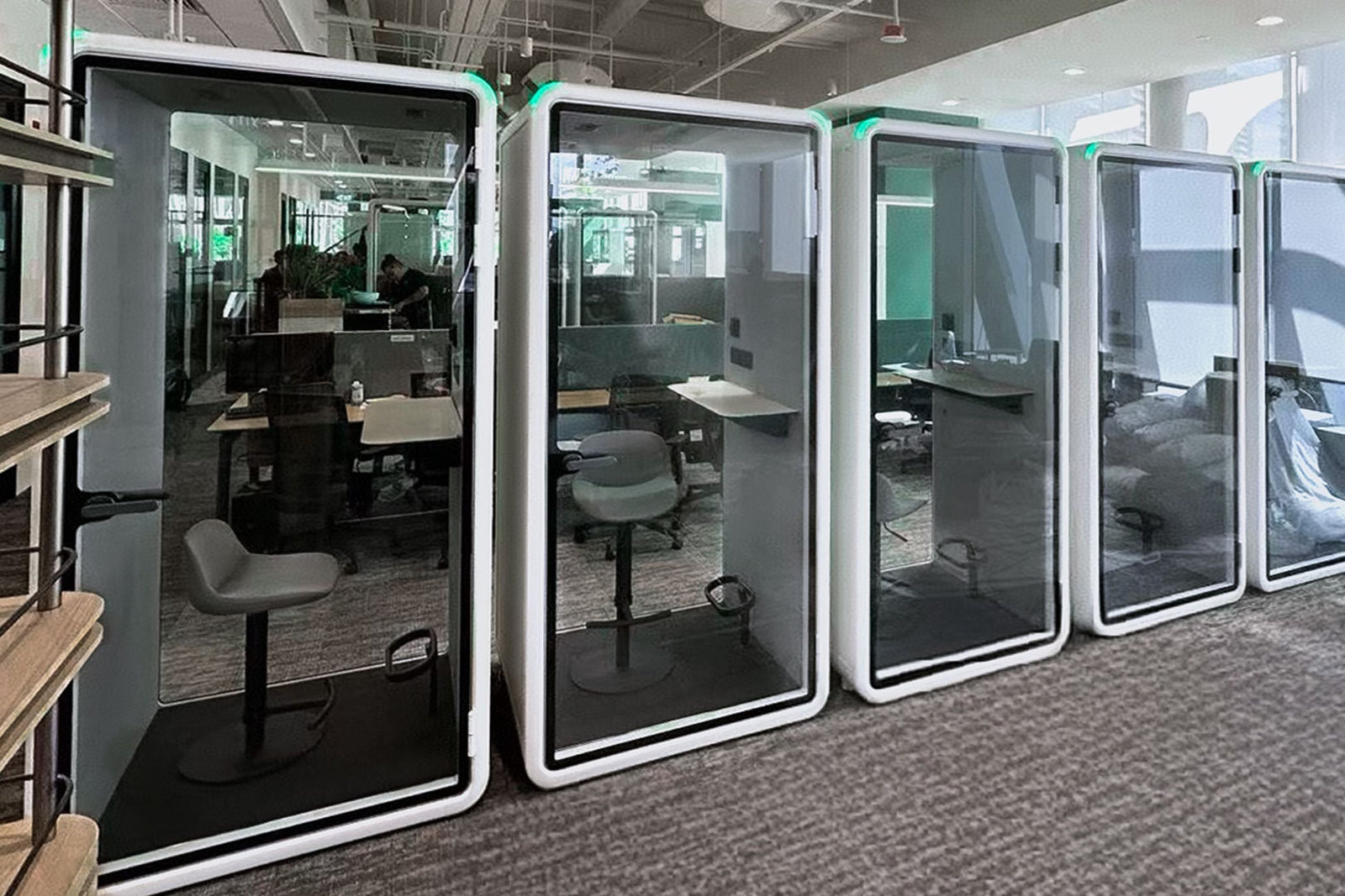 Acoustic office pod in use on a working office floor