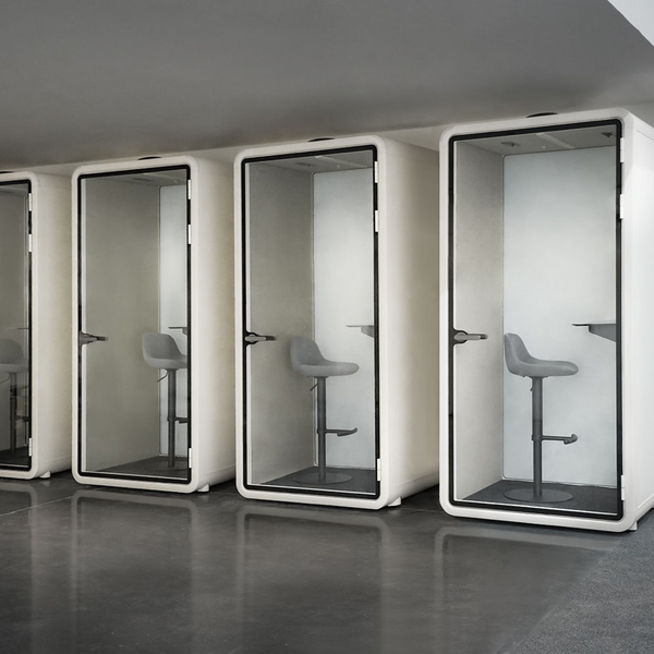 Office phone booth beside desks in an Adelaide office