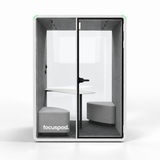 FocusPod Duo front view in Arctic White with optional two-person bench seating and shared table, and FocusPod logo on the lower left glass.