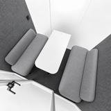 FocusPod Meet top-down interior view of two long upholstered sofas and central meeting table.