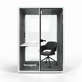 FocusPod Solo Plus front view in Arctic White with optional ergonomic chair and desk, and FocusPod logo on the lower left glass.