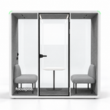 FocusPod Team front studio view with optional two-seat furniture package and low left glass logo.