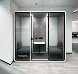 FocusPod Team installed in an office with the white FocusPod logo low on the left glass.